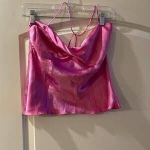 Top halter pink satin twisted bust area very flattering.